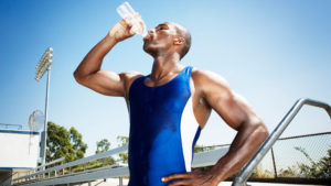 athlete drinking water