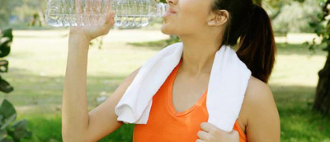 woman drinking water to prevent dehydration